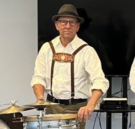 Portrait of Mike Dank, OompahME’s drummer